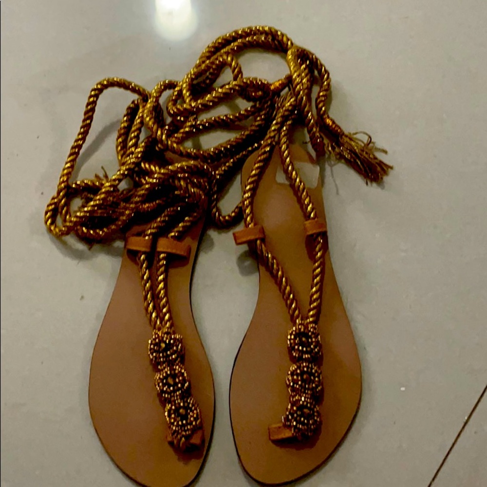 Lace up gold sandals